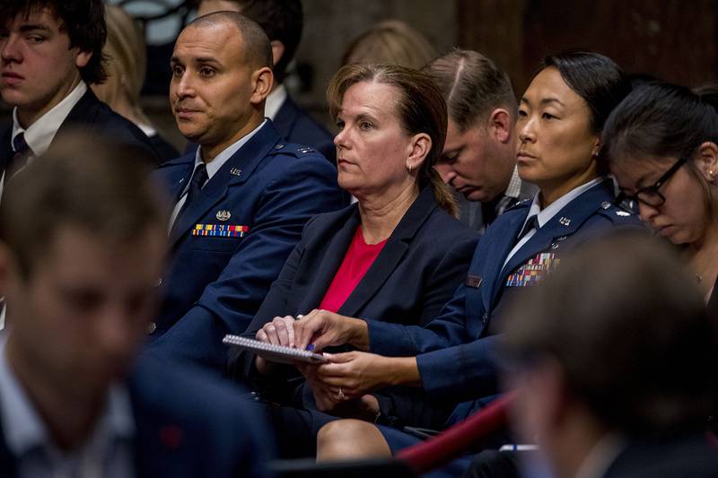 Former aide Army Col. Kathryn Spletstoser sits in the audience as Gen. John Hyten appears before the Senate Armed Services Committee on Capitol Hill in Washington, Tuesday, July 30, 2019, for his confirmation hearing to be vice chairman of the Joint Chiefs of Staff.