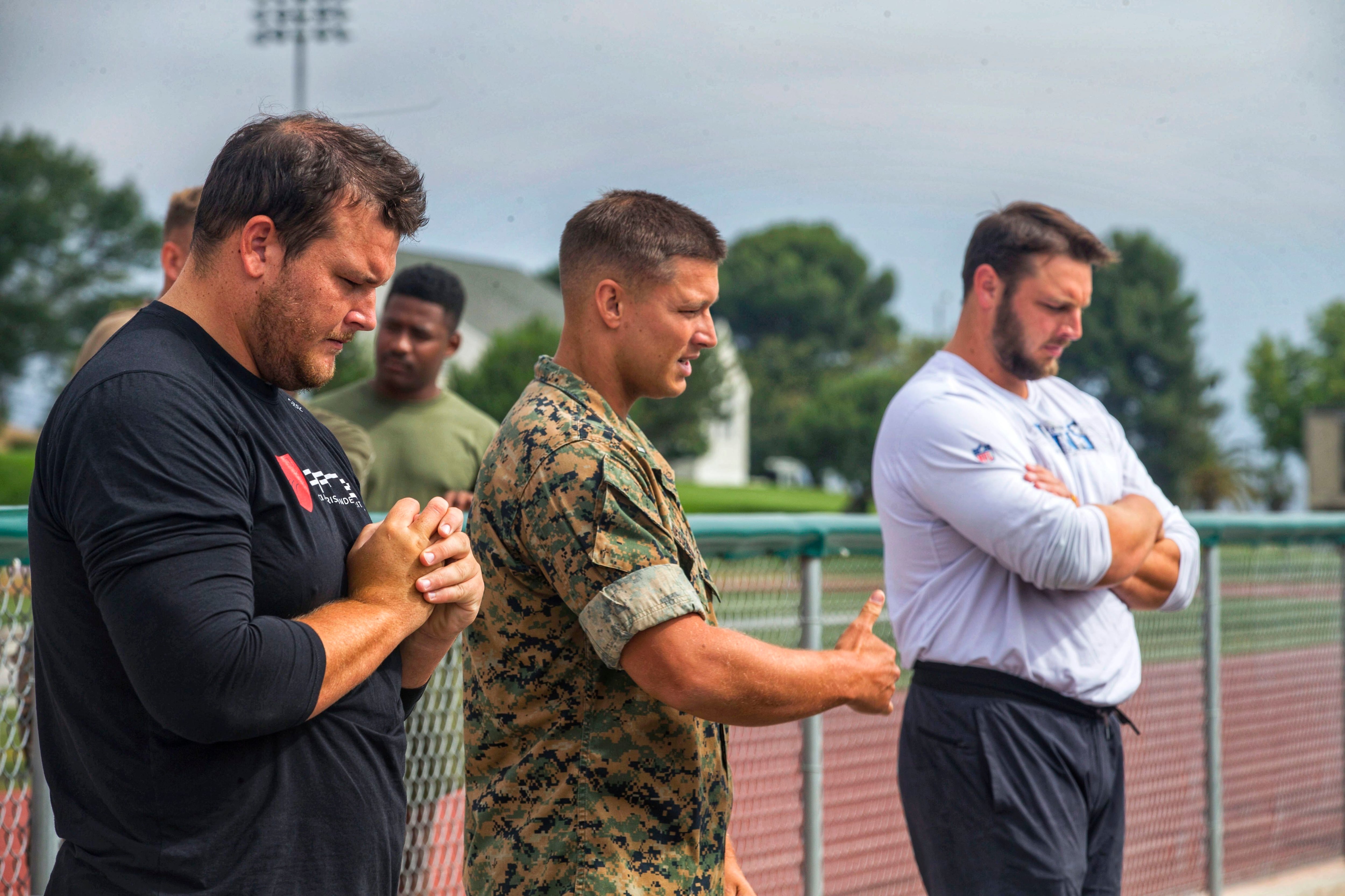 Marine turns in MARPAT for Patriots' navy blues