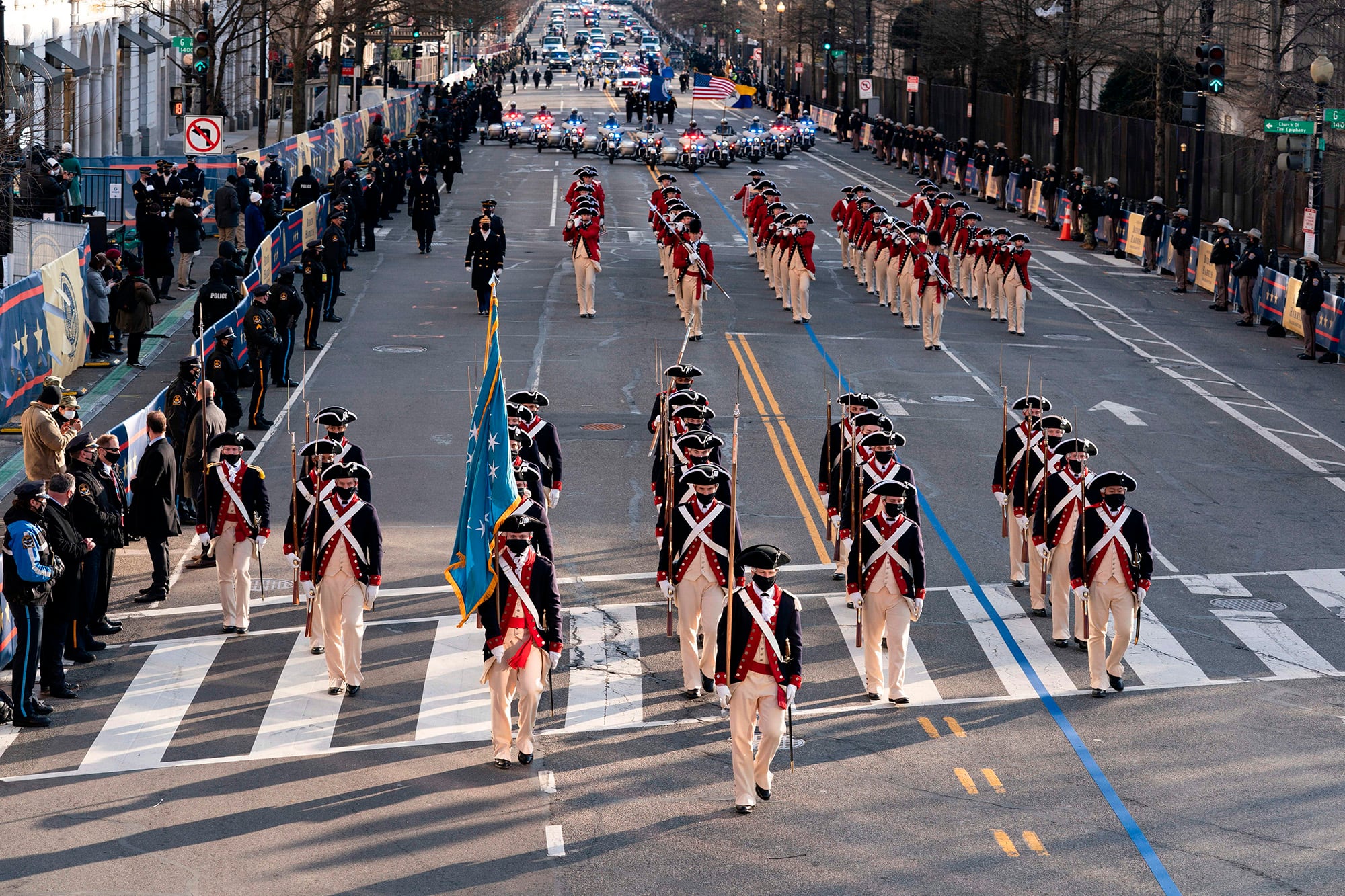 Members of the military march on 15th Street towards the White House during a presidential escort to the White House  following President Joe Biden taking the oath of office in Washington on Jan. 20, 2021.