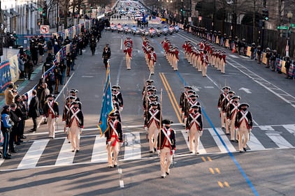 Members of the military march on 15th Street towards the White House during a presidential escort to the White House  following President Joe Biden taking the oath of office in Washington on Jan. 20, 2021.