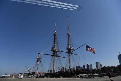 The U.S. Air Force Thunderbirds fly over the USS Constitution in Boston Harbor during a ‘Salute to Great Cities of the American Revolution’ on July 4, 2020. The Department of Defense conducted the flyover of Boston to recognize the role the city played in the birth of the nation.