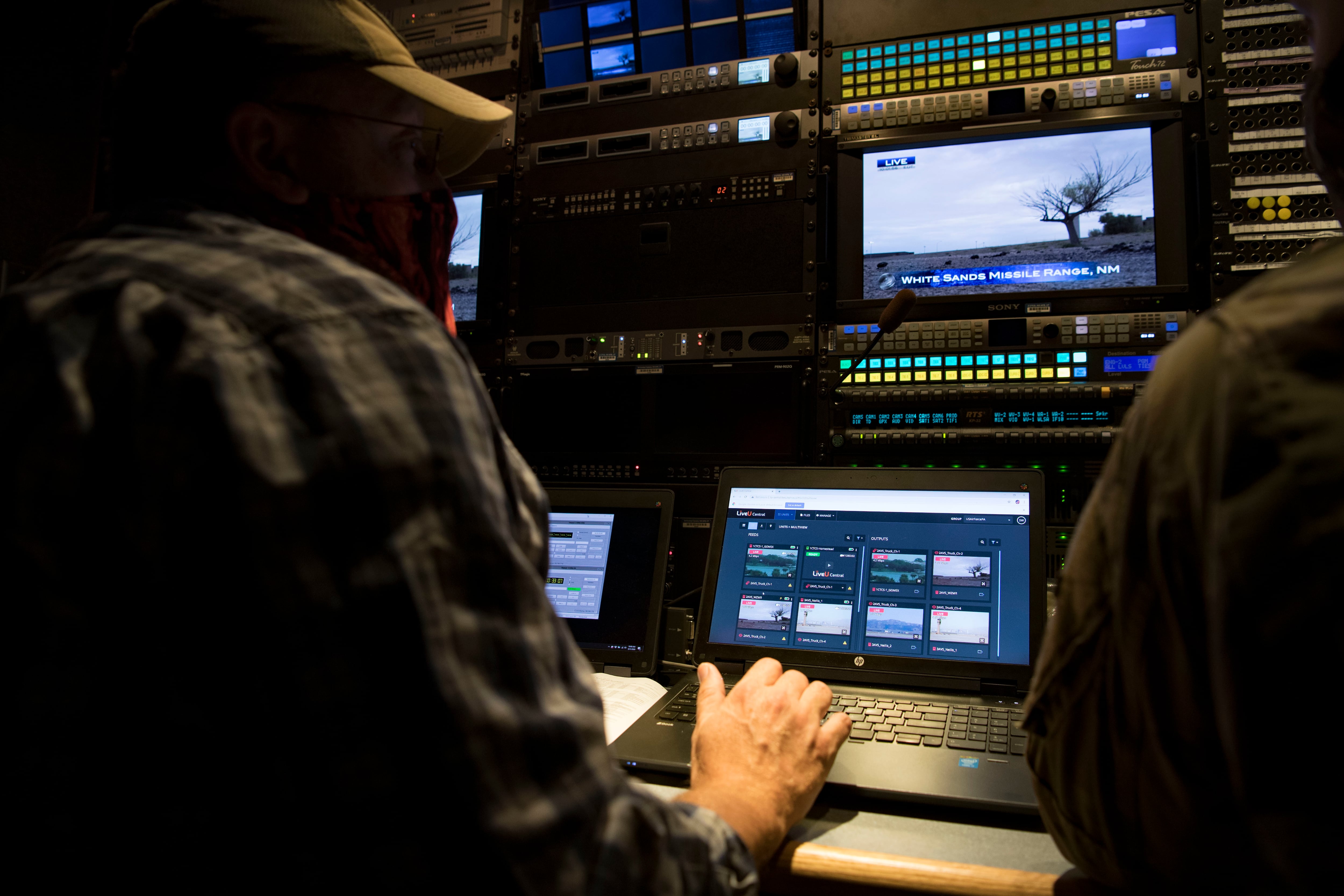 Jason Davis, a cyber technician from the 2nd Audiovisual Squadron, monitors a live feed inside a production truck in support of the Advanced Battle Management System Onramp 2 event in August 2020.