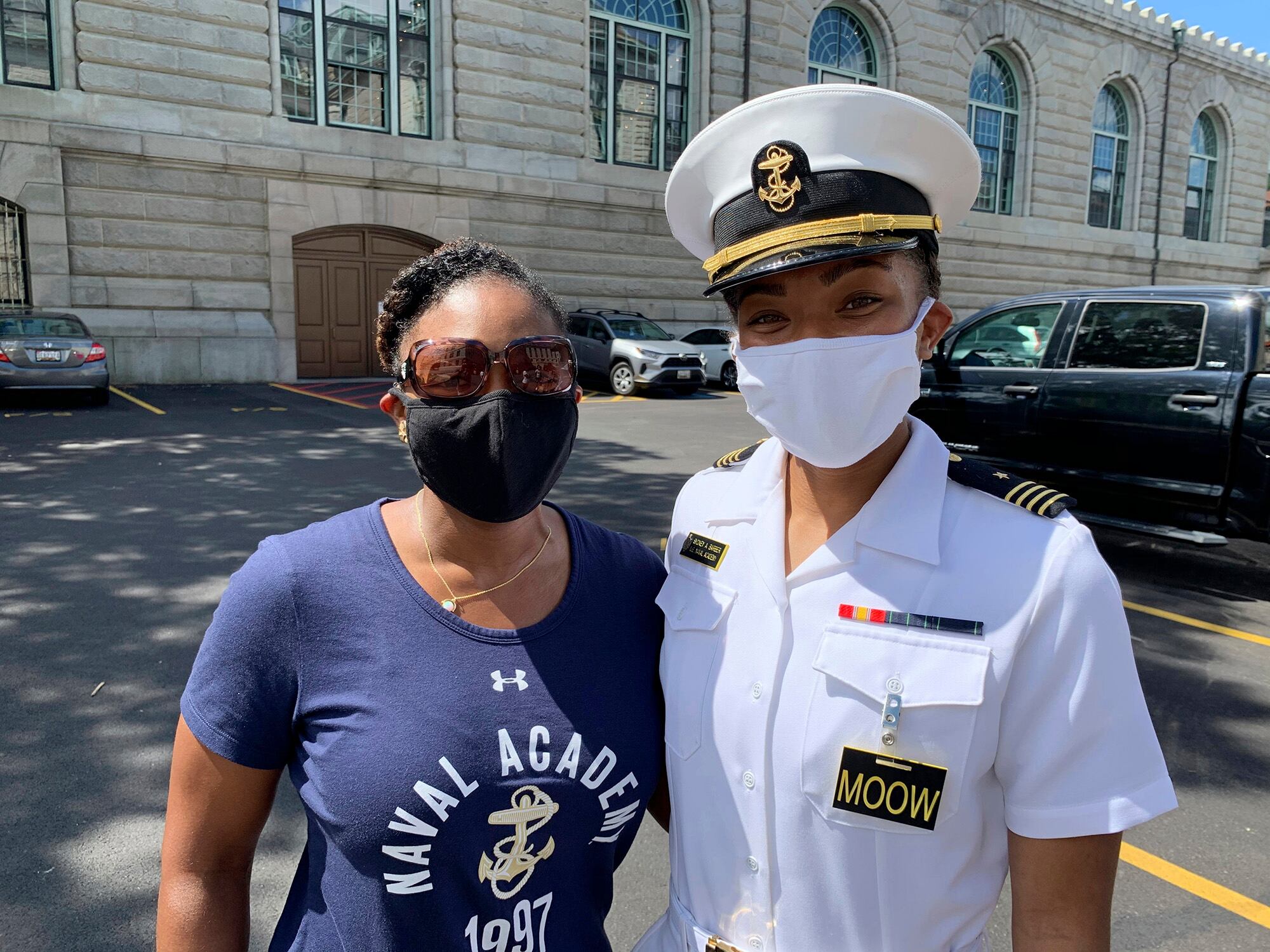 Navy Capt. Tasya Lacy, left, a 1997 graduate of the U.S. Naval Academy, stands next to Midshipman Sydney Barber on Aug. 30, 2020, in Annapolis, Md.