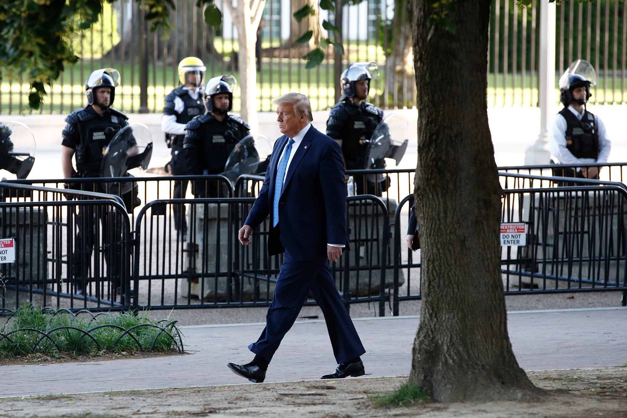 President Donald Trump walks in Lafayette Park to visit outside St. John's Church across from the White House Monday, June 1, 2020, in Washington. Part of the church was set on fire during protests on Sunday night.