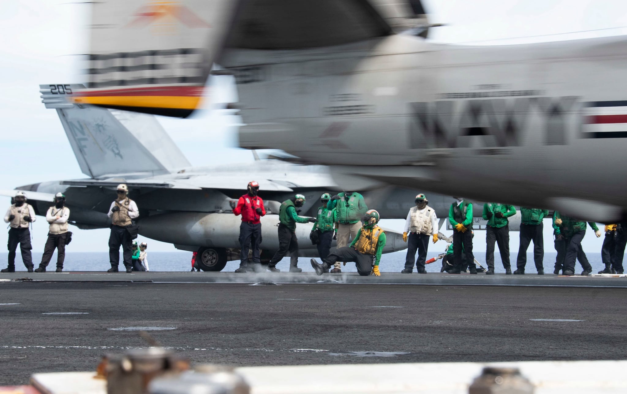 An E-2D Hawkeye launches from the flight deck of the aircraft carrier USS Ronald Reagan (CVN 76) during flight operations June 17, 2020, in the Philippine Sea.