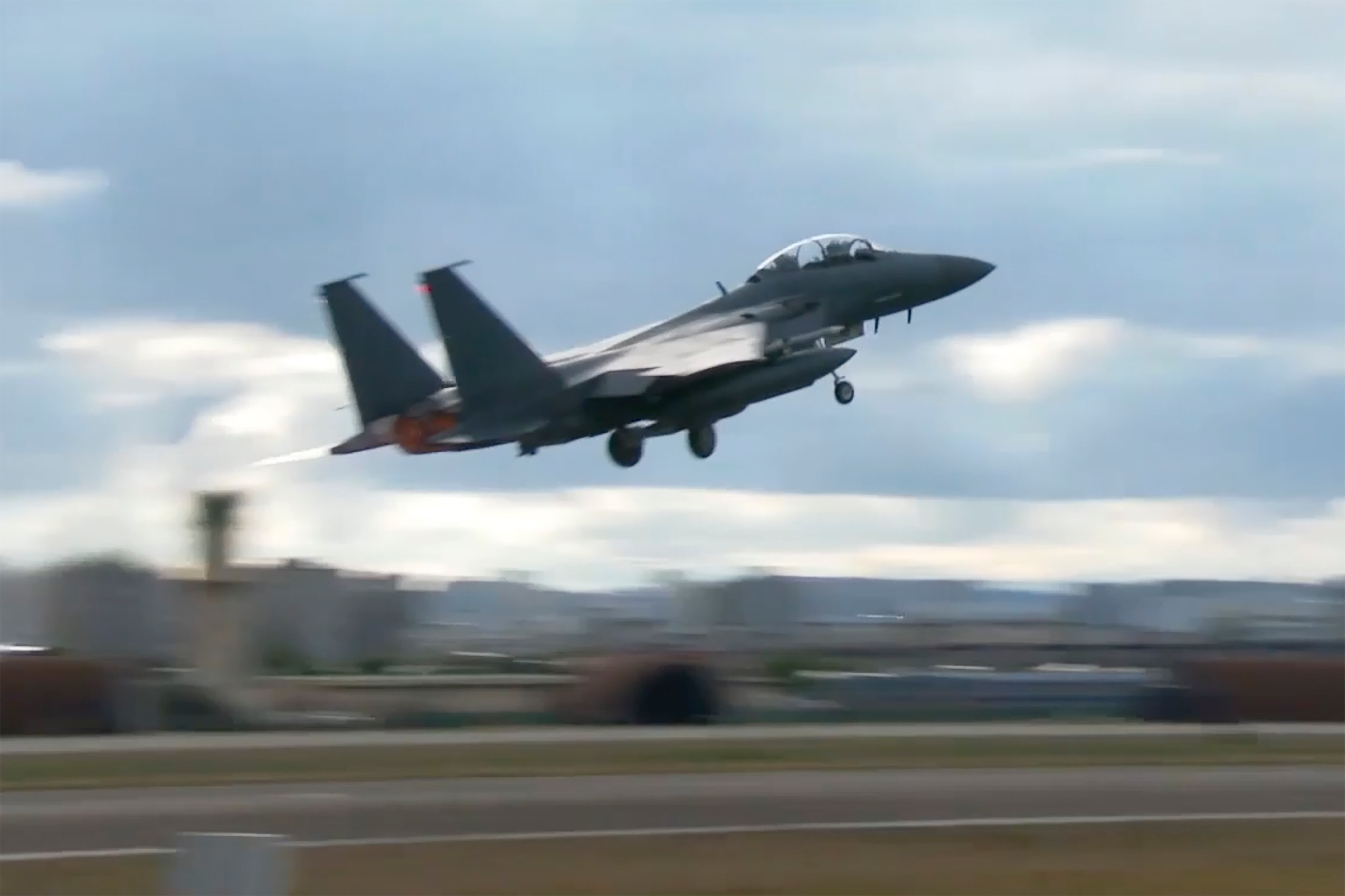 In this image taken from video, South Korean Air Force's F15K fighter jet takes off Tuesday, Oct. 4, 2022, in an undisclosed location in South Korea.