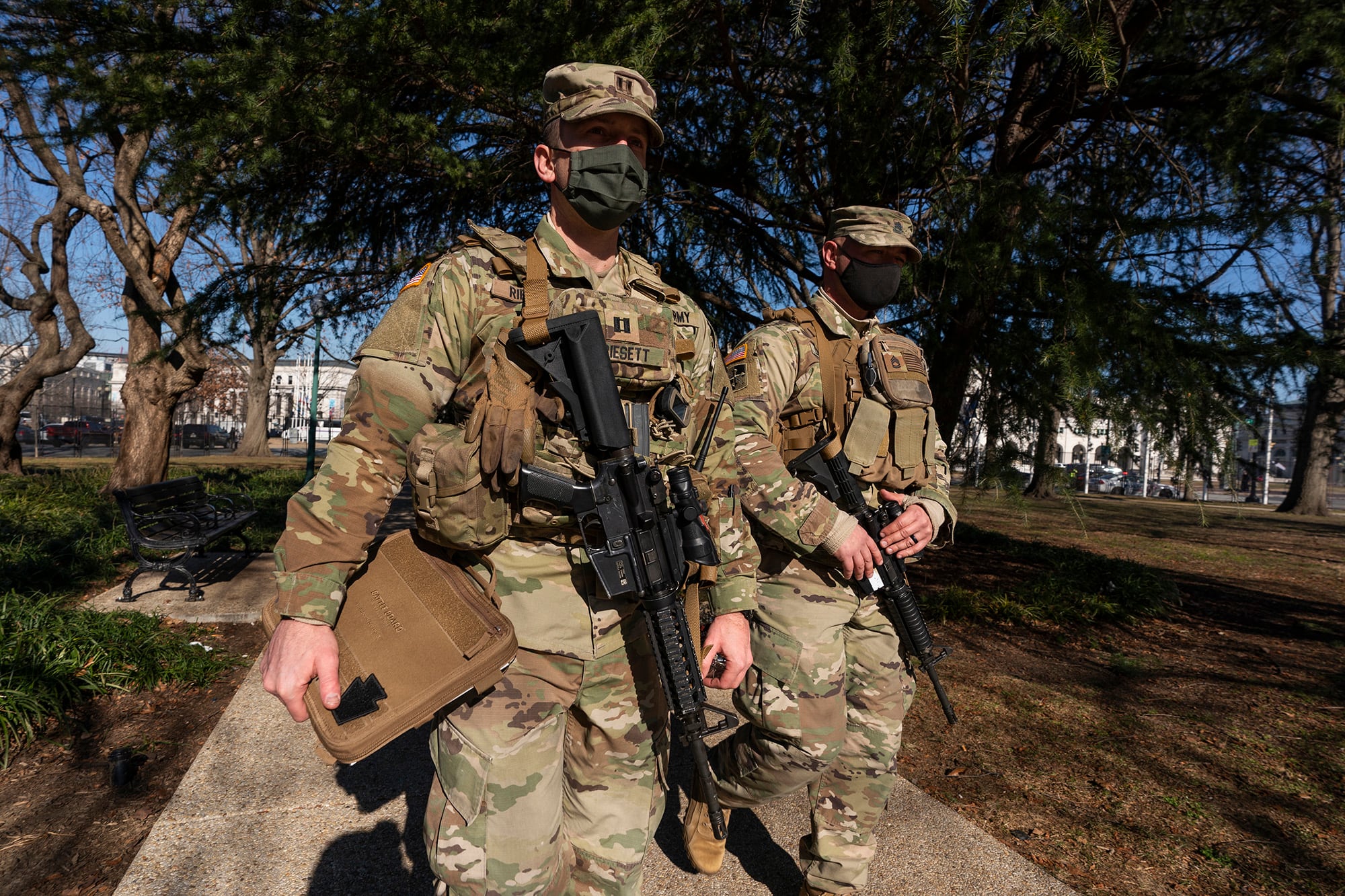 Armed members of the Maryland National Guard secures the perimeter around the U.S. Capitol, Wednesday, Jan. 13, 2021, in Washington.