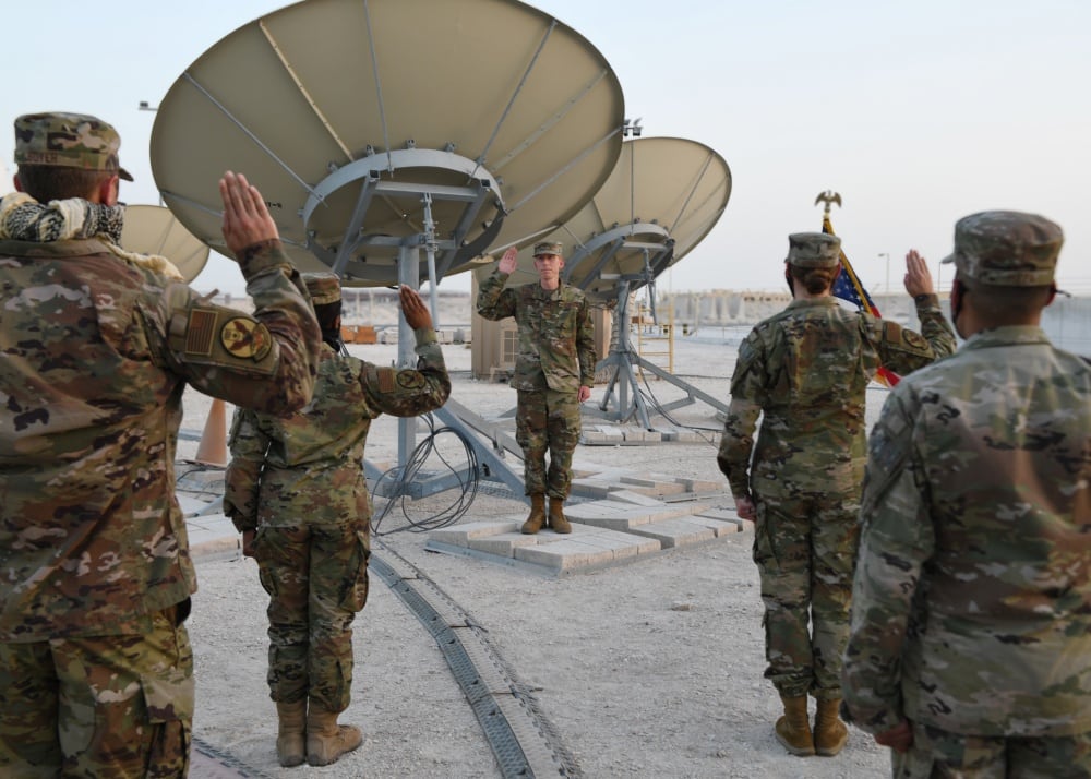 Col. Todd Benson, the U.S. Air Forces Central Command director of space forces, leads airmen through their enlistment ceremony as they become members of the Space Force at Al Udeid Air Base, Qatar, on Sept. 1, 2020. The Space Force is the United States' newest service in more than 70 years. (Staff Sgt. Kayla White/U.S. Air Force)