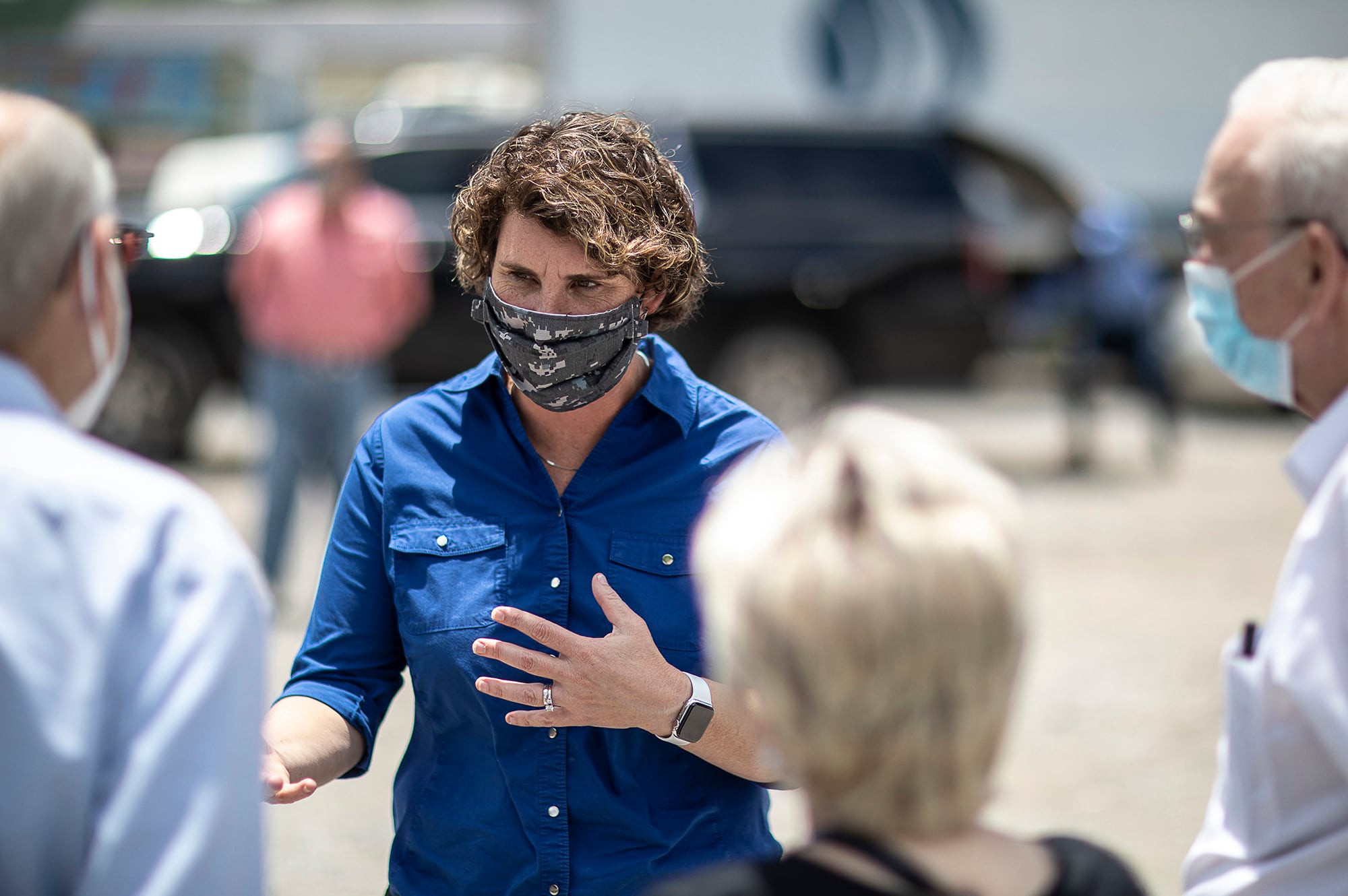 In this June 22, 2020, file photo, Amy McGrath, a candidate for the Democratic nomination to U.S. Senate, speaks to people during a visit to Thankful Hearts Food Pantry in Pikeville, Ky.