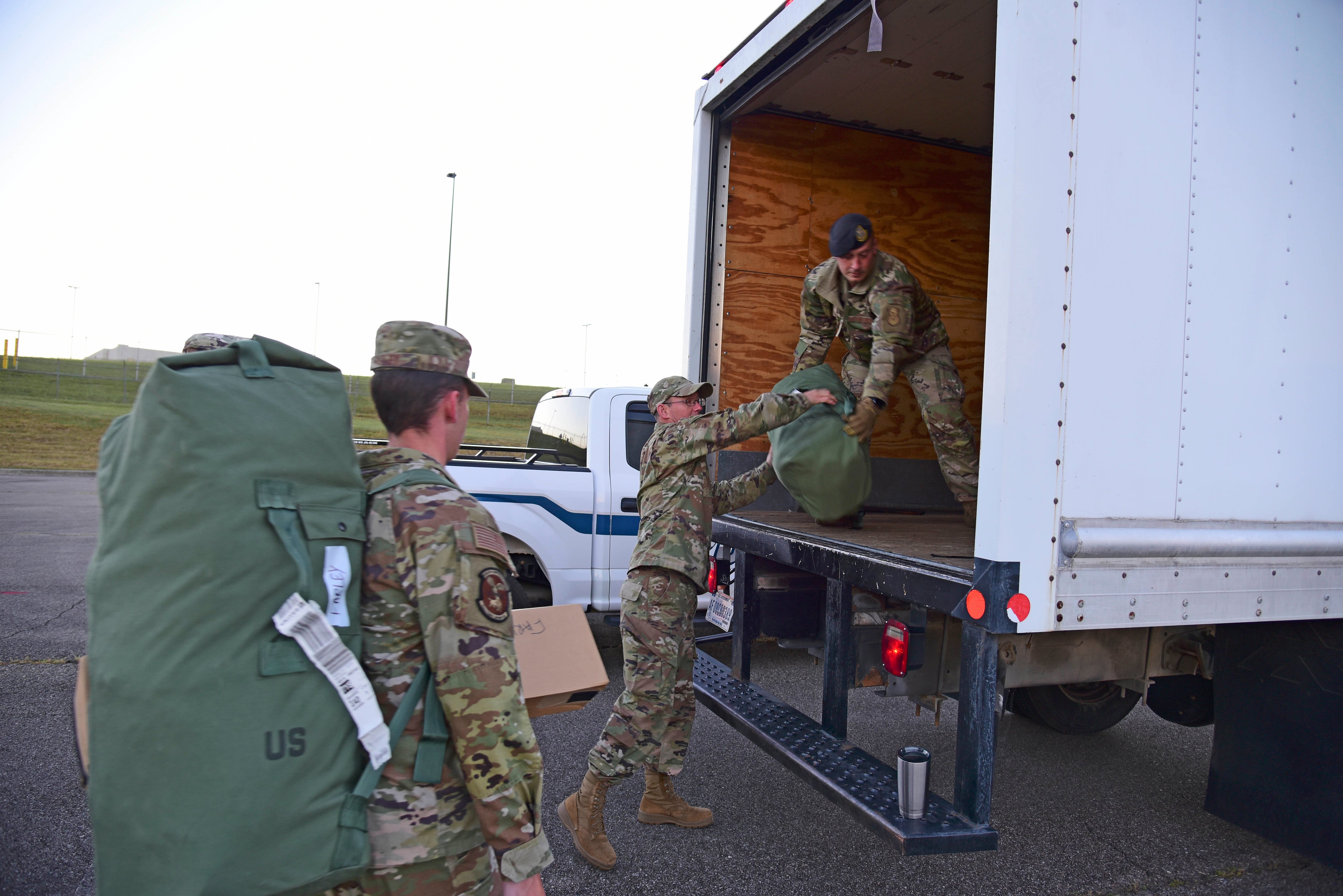 Airmen from the 134th Air Refueling Wing prepare to depart to assist with natural disaster relief operations in the aftermath of Hurricane Ian.