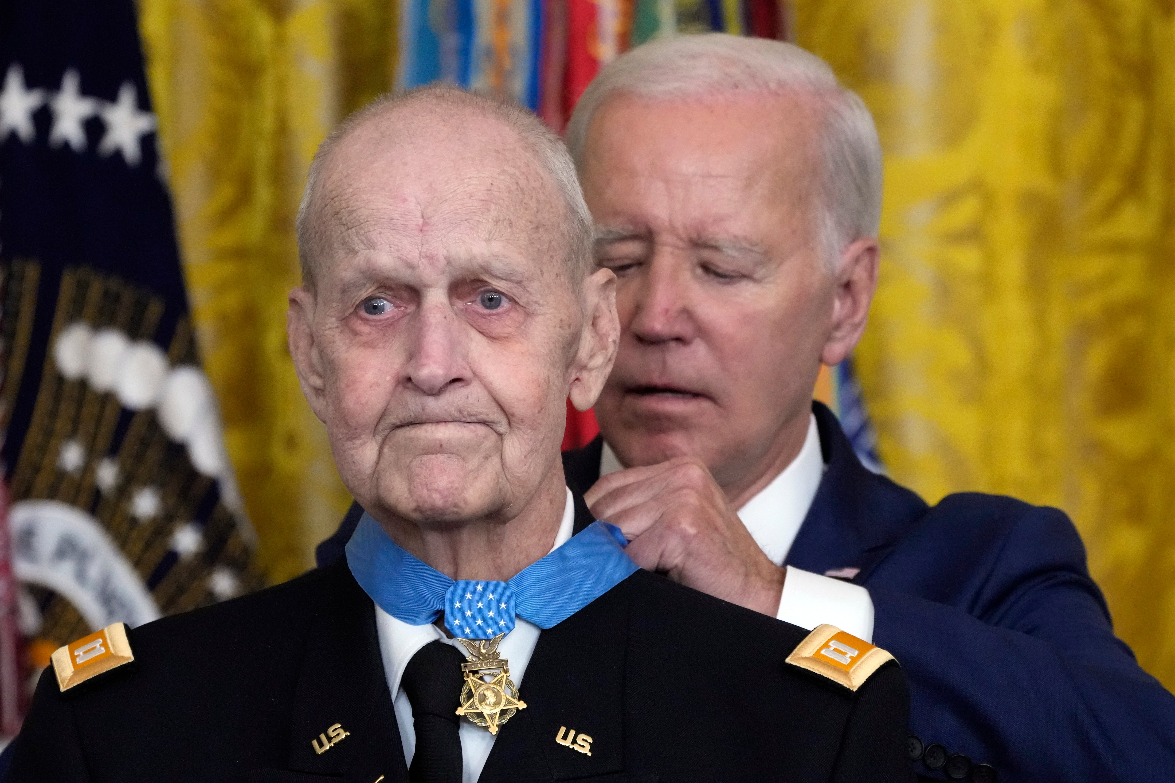 President Joe Biden awards the Medal of Honor to Capt. Larry Taylor, an Army pilot from the Vietnam War who risked his life to rescue a reconnaissance team that was about to be overrun by the enemy, during a ceremony Tuesday, Sept. 5, 2023, in the East Room of the White House in Washington.