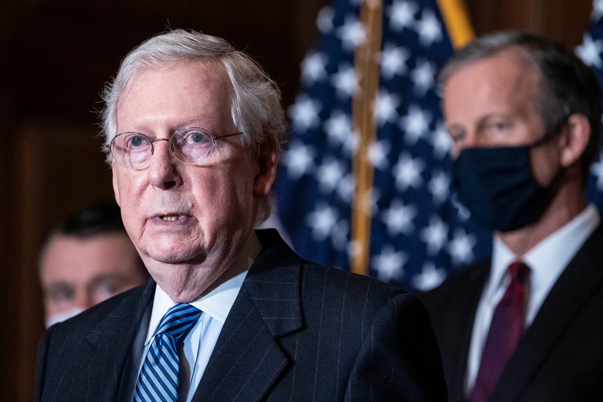 Senate Majority Leader Mitch McConnell of Kentucky, speaks during a news conference following a weekly meeting with the Senate Republican caucus, Tuesday, Dec. 8. 2020, at the Capitol in Washington.