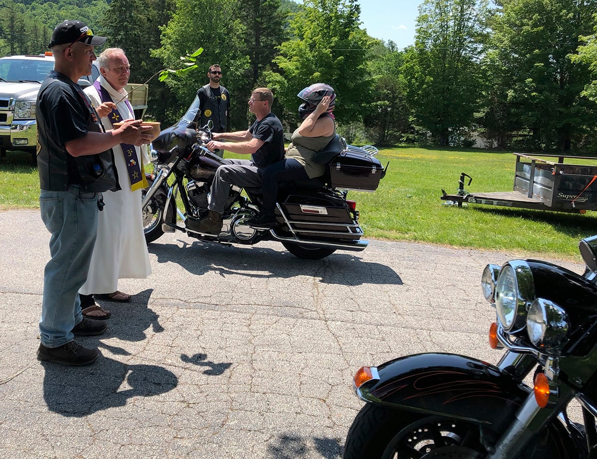 Motorcyclists participate in a "Blessing of the Bikes" ceremony in Columbia, N.H., Sunday, June 23, 2019.