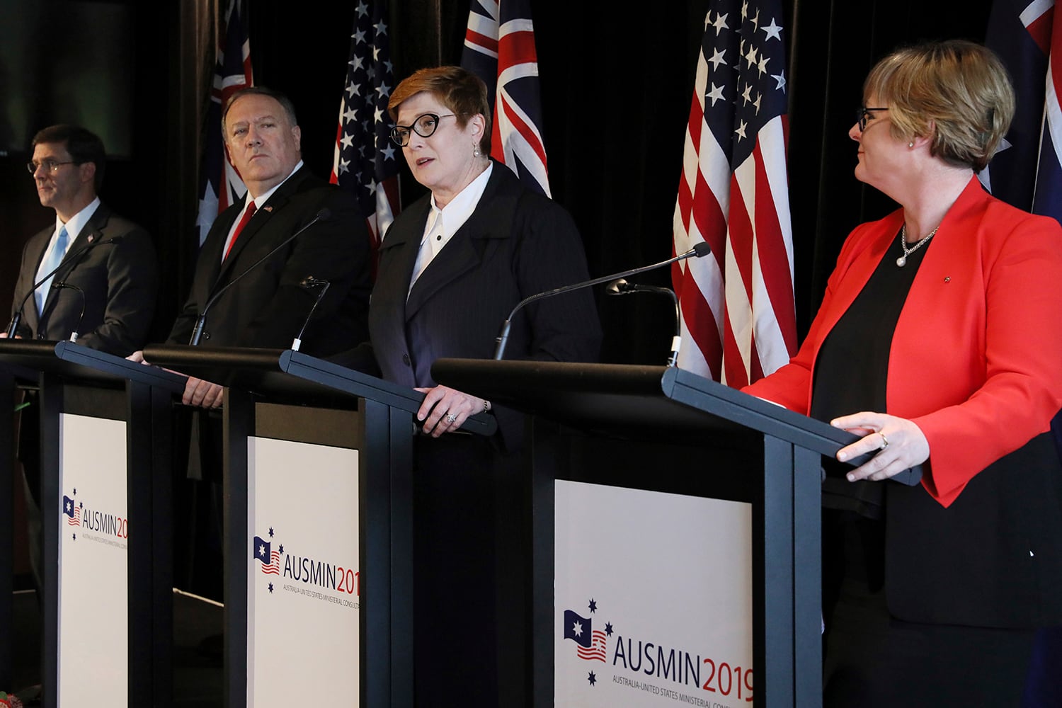 Australia's Foreign Minister Marise Payne, second from right, speaks during a joint news conference with U.S. Secretary of Defense Mark Esper, left, U.S. Secretary of State Mike Pompeo, second from left, and Australia's Defense Minister Linda Reynolds in Sydney, Australia, Sunday, Aug. 4, 2019.