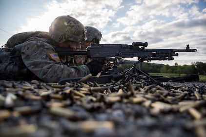 New Bravo Company cadets learn how to properly handle a M230B machine gun as part of their Cadet Basic Training at Camp Buckner, N.Y., Aug. 1, 2019.