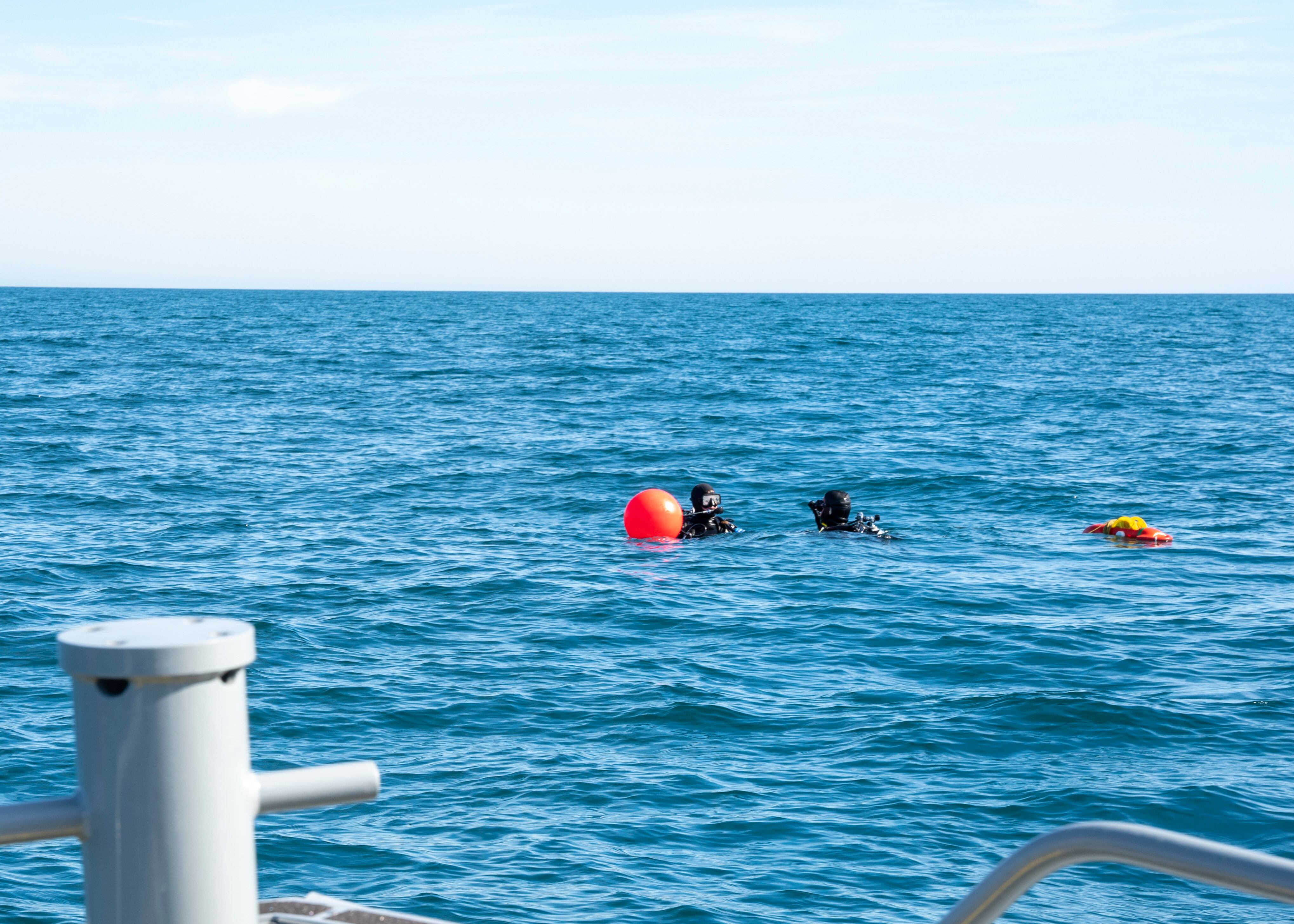 Sailors prepare to conduct a search for debris during recovery efforts of a high altitude balloon in the Atlantic Ocean, Feb. 7, 2023.