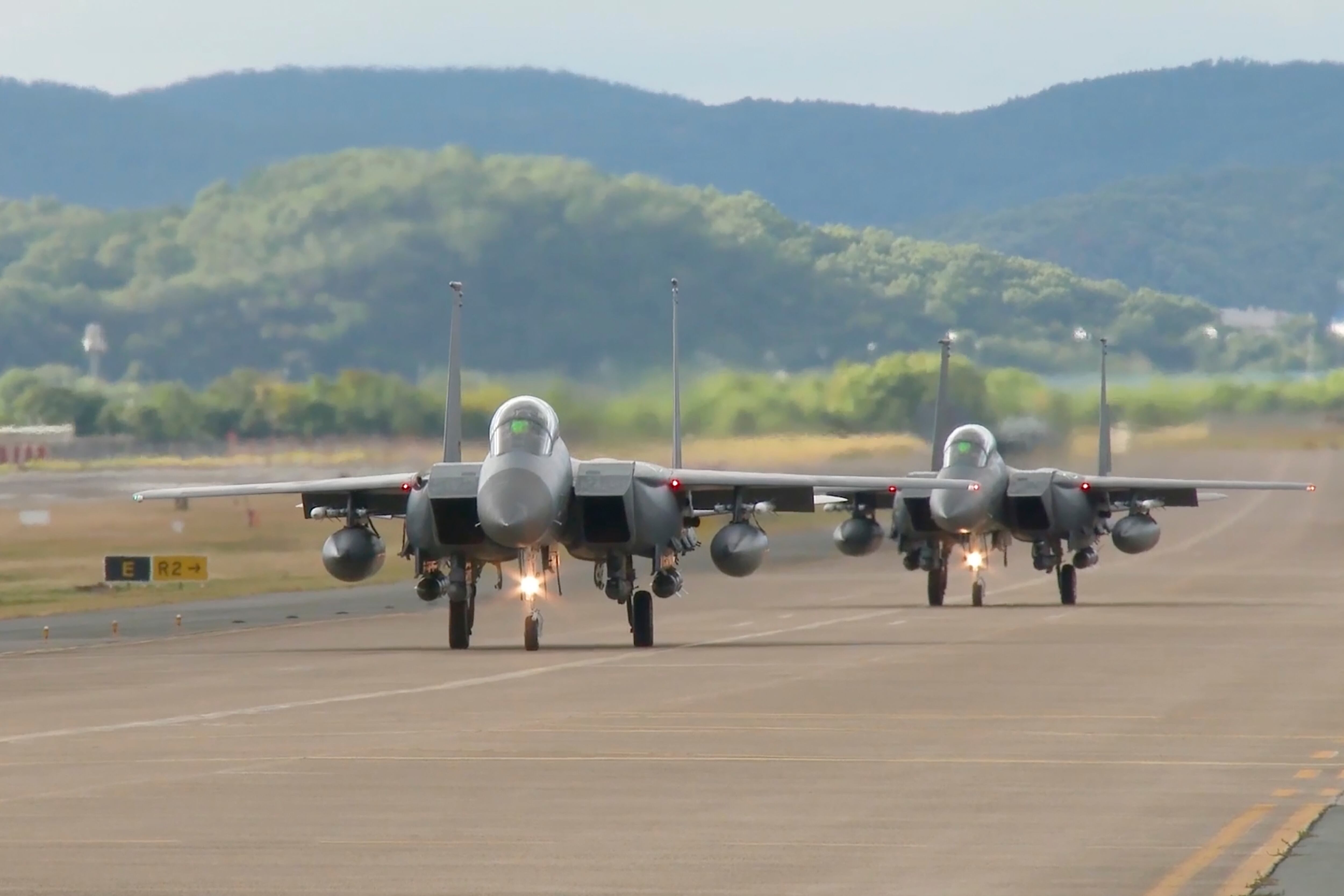 In this image taken from video, South Korean Air Force's F15K fighter jets prepare to take off Tuesday, Oct. 4, 2022, in an undisclosed location in South Korea.