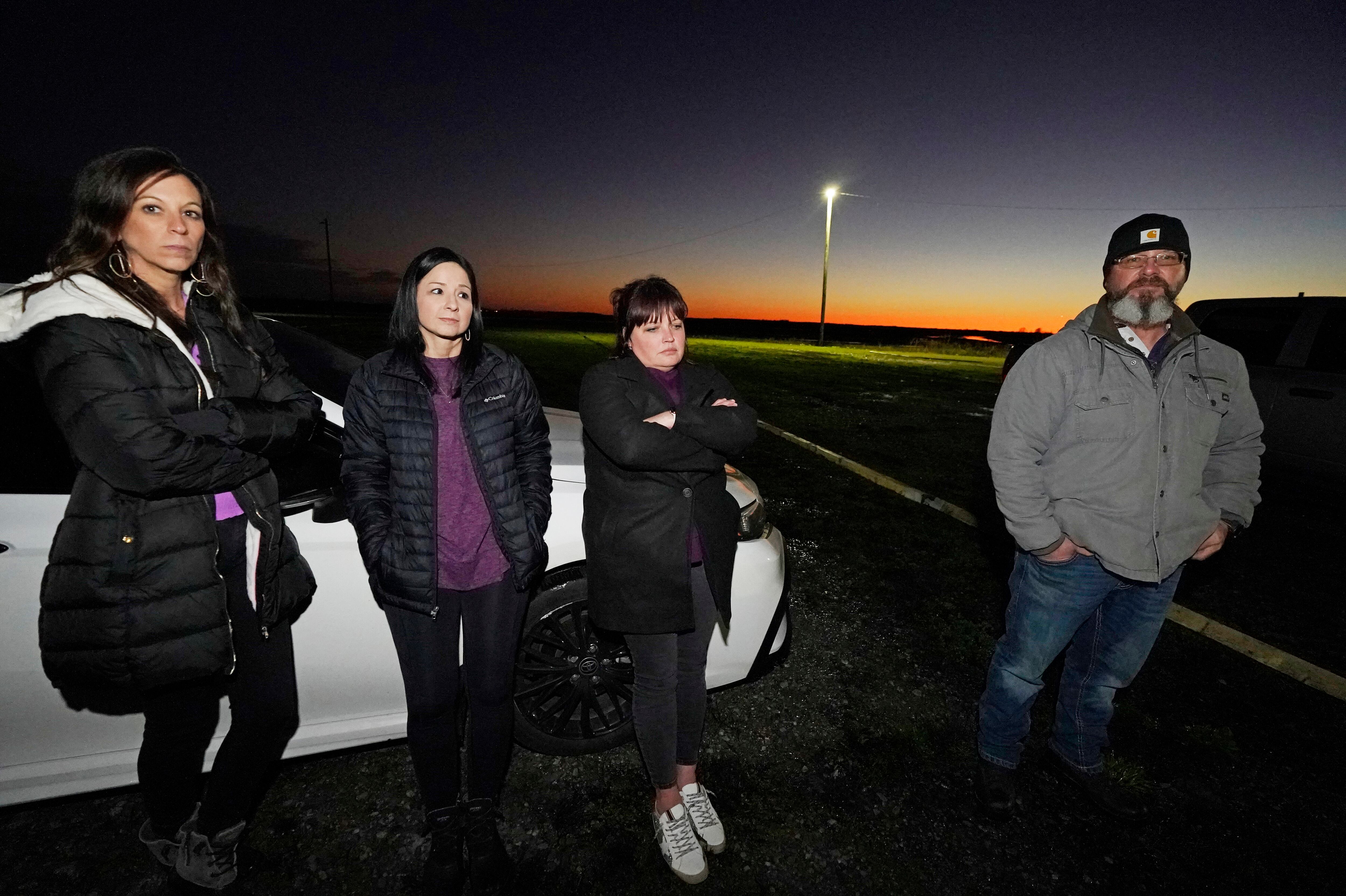 A small group of people gather in support of the mother and family of Leesa Marie Gray, who at age 16 was raped and murdered by Thomas Edwin Loden Jr., who was executed late Wednesday, Dec. 14, 2022, at the Mississippi State Penitentiary in Parchman, Miss.