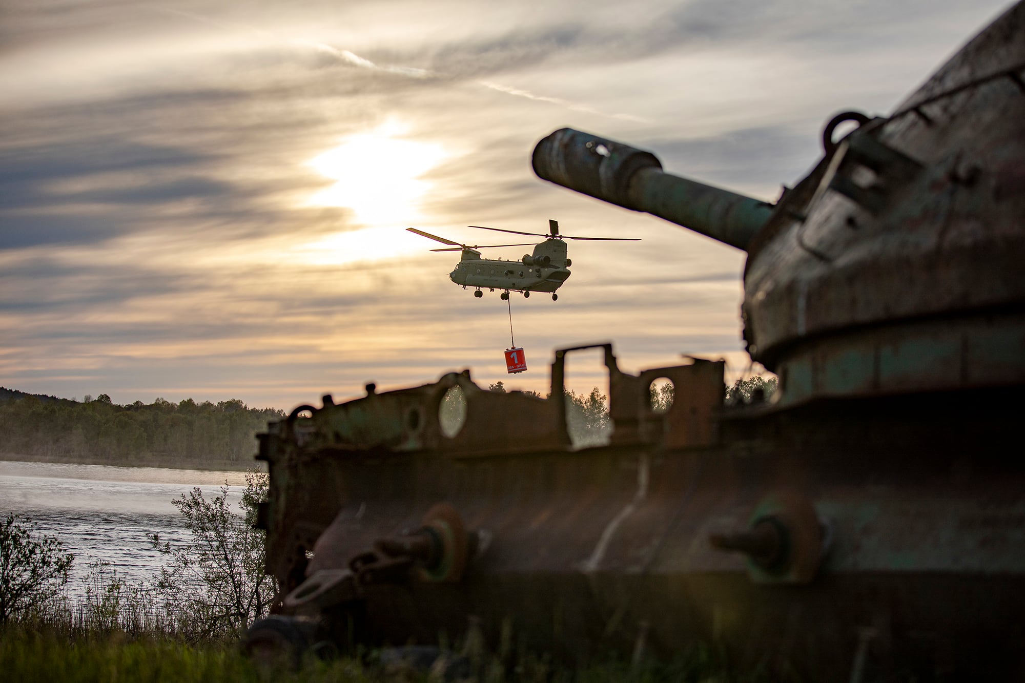 U.S. Soldiers practice fire suppression training using a Bambi water bucket in a CH-47 Chinook helicopter on Grafenwoehr Training Area, Germany, May 12, 2020.