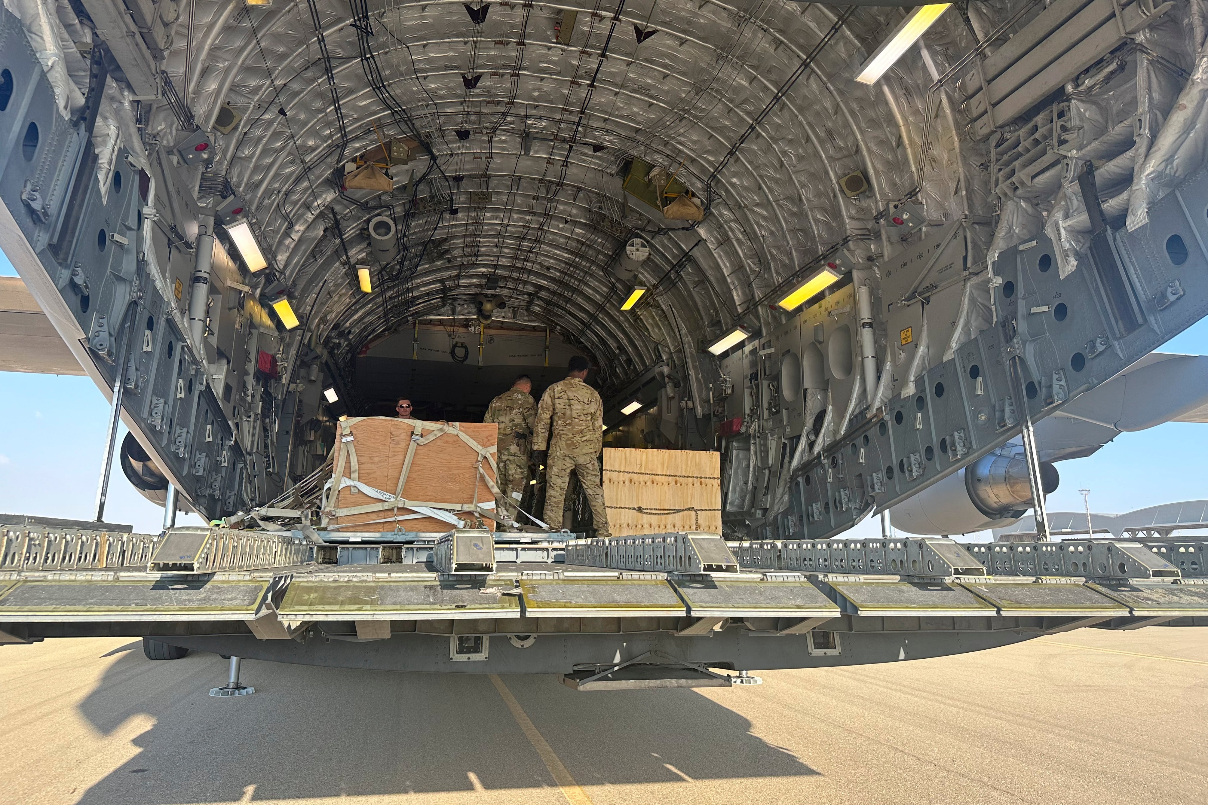 A U.S. C-17 sits at the Nevatim Air Base in the desert in Israel, Friday, Oct. 13, 2023. The aircraft arrived Friday with crates of American munitions for Israel.