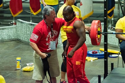 Marine Corps competitor Sgt. Durrell Jones celebrates with his coach after a successful lift during the powerlifting competition at the DoD Warrior Games in Tampa, Fla.