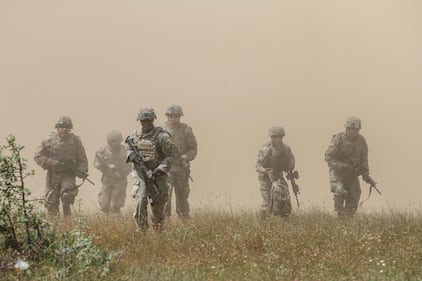 Cavalry scouts maneuver toward cover after an air assault during Platinum Lion 19 at Novo Selo Training Area in Bulgaria on July 9, 2019.