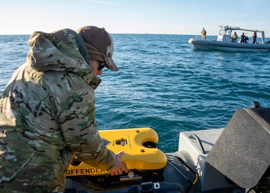 Sailors prepare an underwater vehicle to search for debris during recovery efforts of a high altitude balloon in the Atlantic Ocean, Feb. 7, 2023.