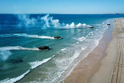 Amphibious assault vehicles approach Langhams Beach in Stanage Bay in Queensland, Australia, during a multinational amphibious landing July 16, 2019, as part of exercise Talisman Sabre 2019.